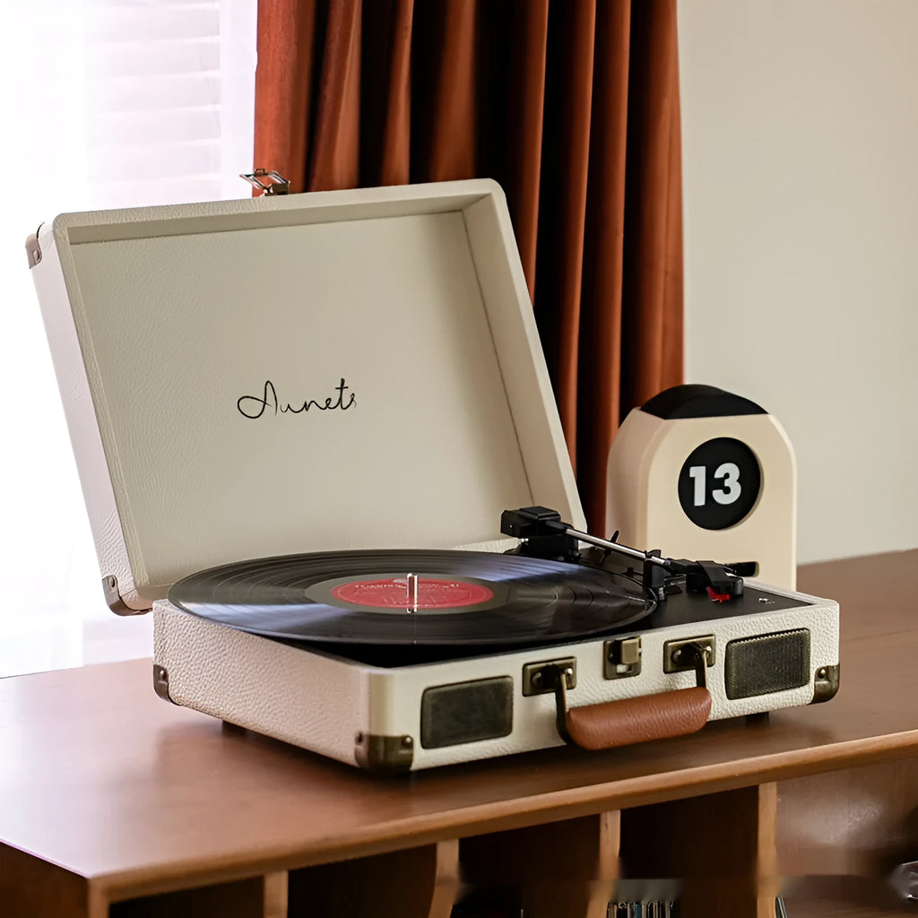 Retro phonograph Bluetooth record player in leather suitcase case with turntable and controls