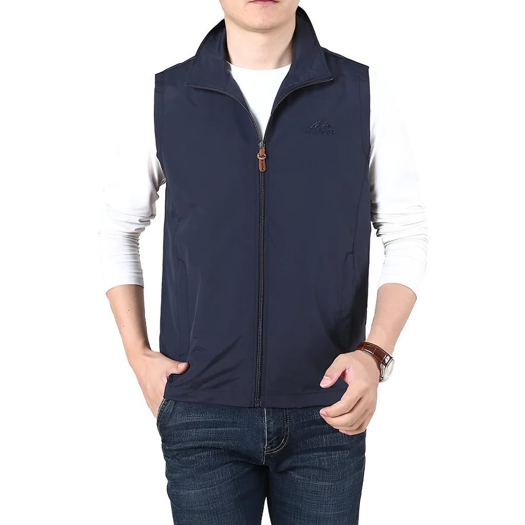 Niandun men's thin casual waistcoat vest in a chemical fibre blend with side pockets.