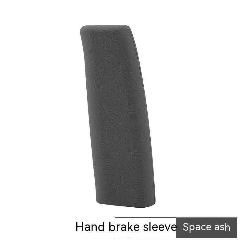 Universal silicone handbrake sleeve in red, shown next to a car's handbrake lever.
