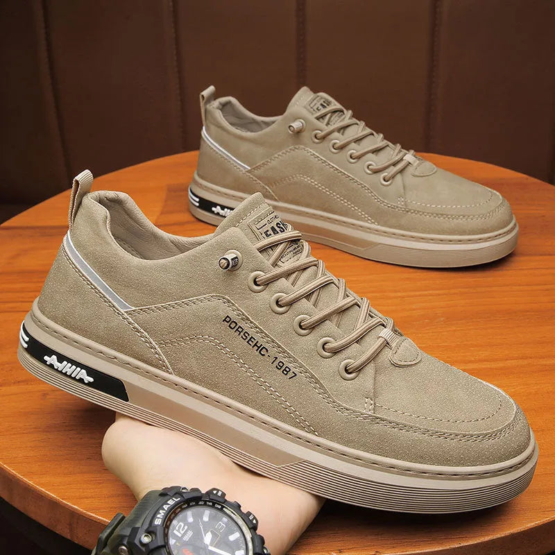 Men's khaki non-slip waterproof casual work sneakers with a round toe and rubber sole.