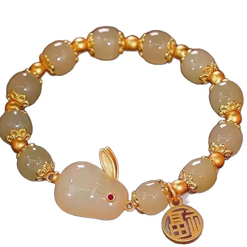 Peace buckle bracelet with rabbit motif, glass and coloured glaze beads