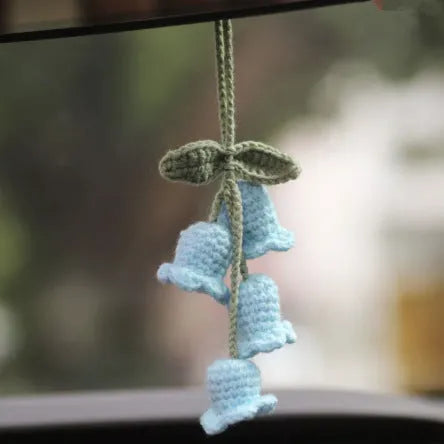 Green and white knitted wool car plant decoration with 8cm base and hanging rope.