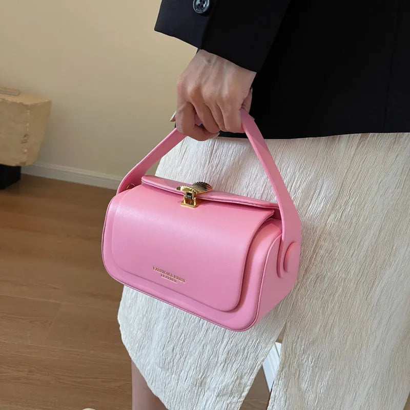 A personalised women's casual messenger bag with letter detailing, shown in beige, black, khaki, and pink colour options.