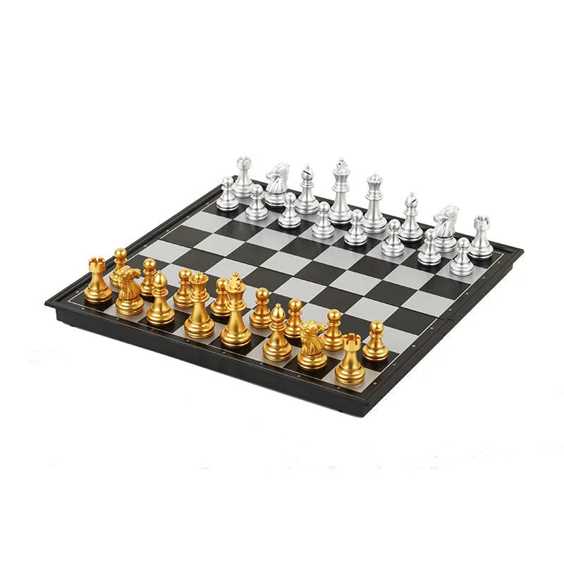 Portable folding ABS chessboard in 32cm size on a table
