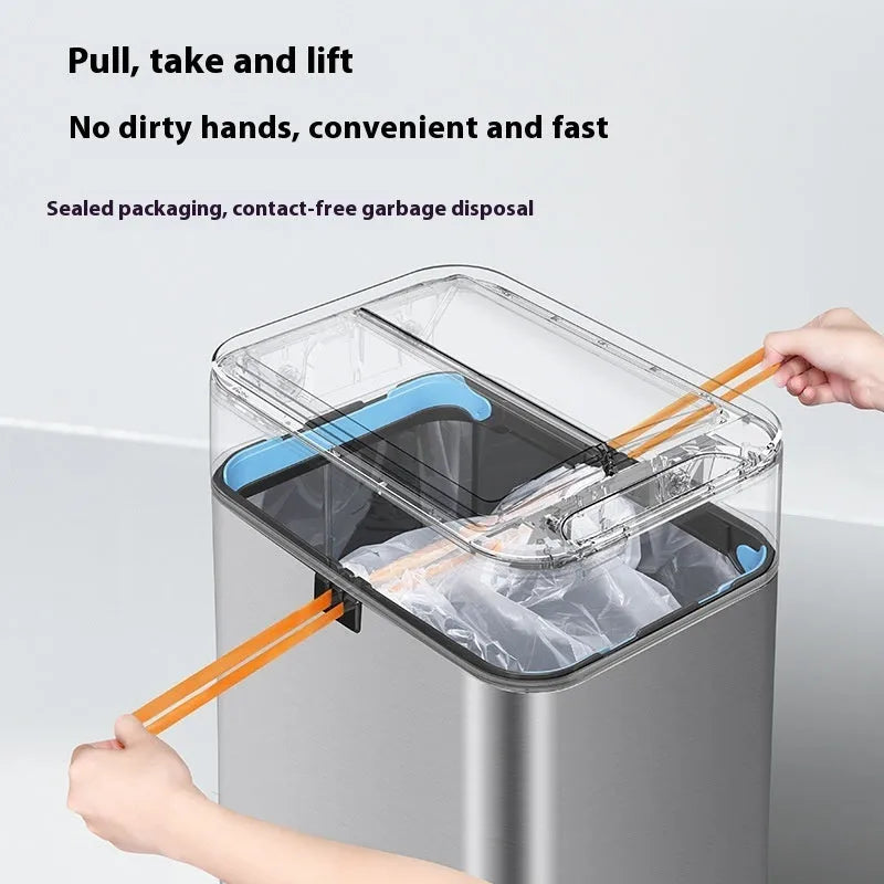 Stainless steel inductive smart trash can with square design on a kitchen floor.