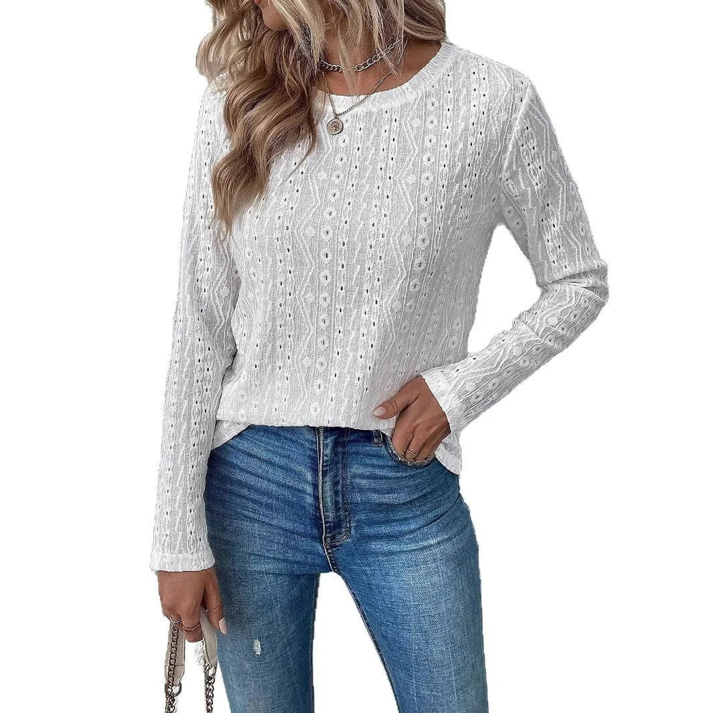 White women's long sleeve t-shirt with round neck and loose fit design