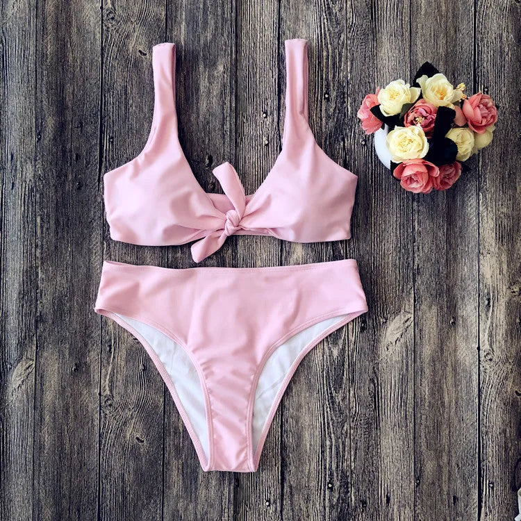 Women's two-piece bikini set in solid colour with bra top and matching panties