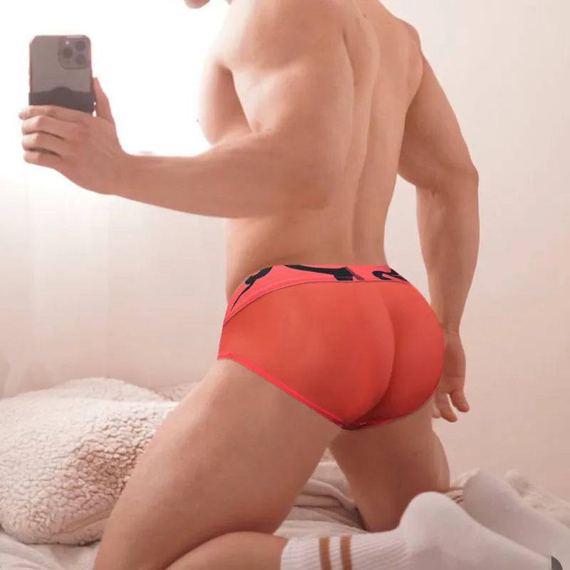 Men's solid colour cotton modal boxer shorts with low waist and breathable net stitching