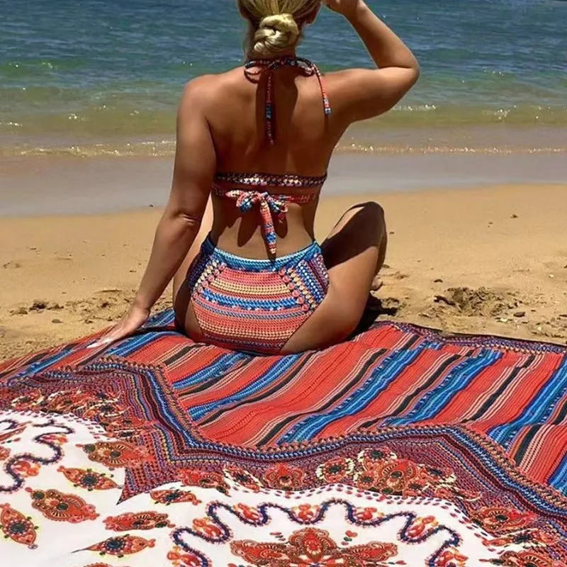 Ladies three-piece swimsuit set with high-waisted briefs, cutout blouse top, and a long coat.