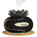 Pure black lotus-shaped ultrasonic humidifier with USB cable connection