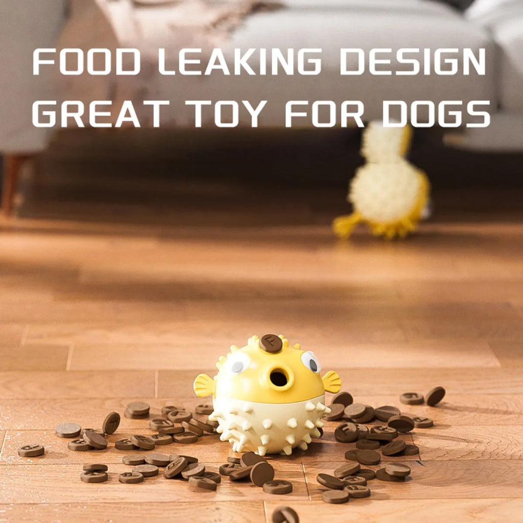 Yellow durable fish-shaped vinyl dog chew toy with textured surface and squeaker.