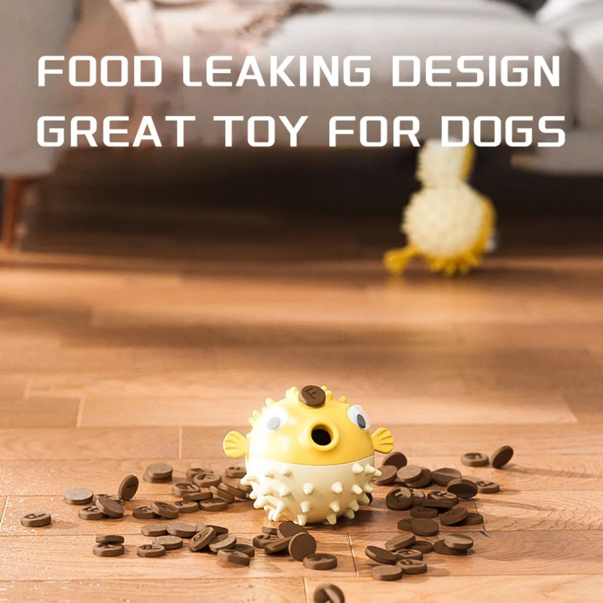 Yellow durable fish-shaped vinyl dog chew toy with textured surface and squeaker.