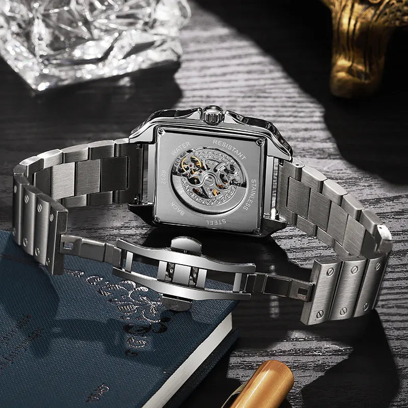 Men's square-faced automatic watch with diamond-studded case on a choice of strap.