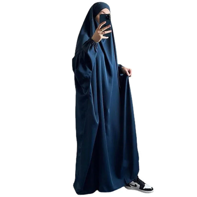 Women's one-piece prayer dress in dark green polyester with regular sleeves and strap details
