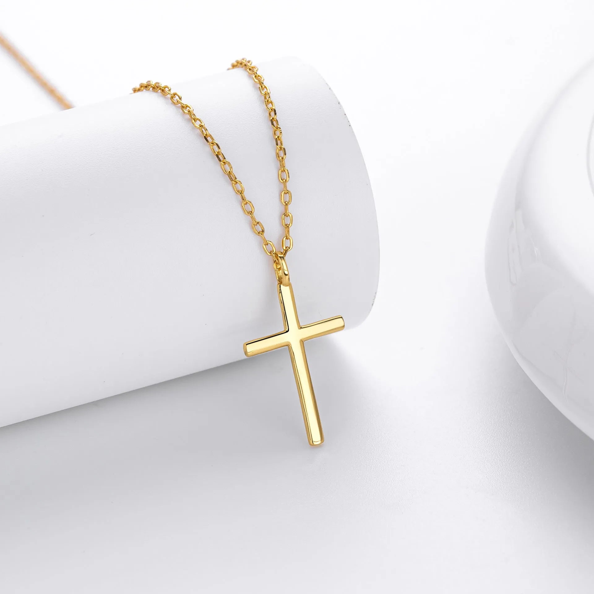 Sterling silver necklace with simple cross pendant on O-shaped chain in gold, platinum, or rose gold finish
