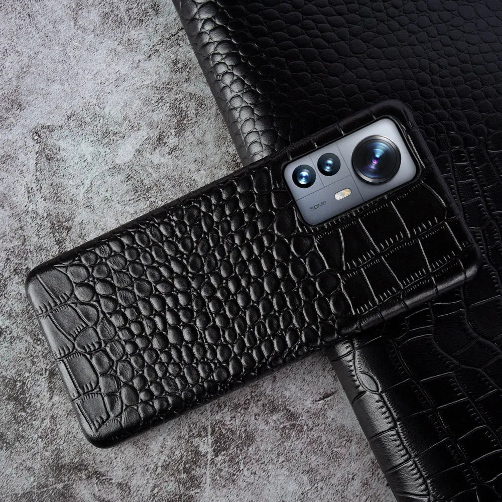 Anti-fingerprint genuine leather half pack phone case in black for Apple iPhone 14 Pro