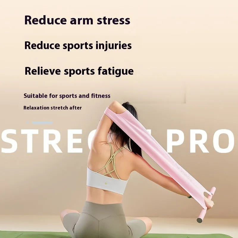Grey and pink yoga stretching tool for open shoulder, back and hip flexibility.