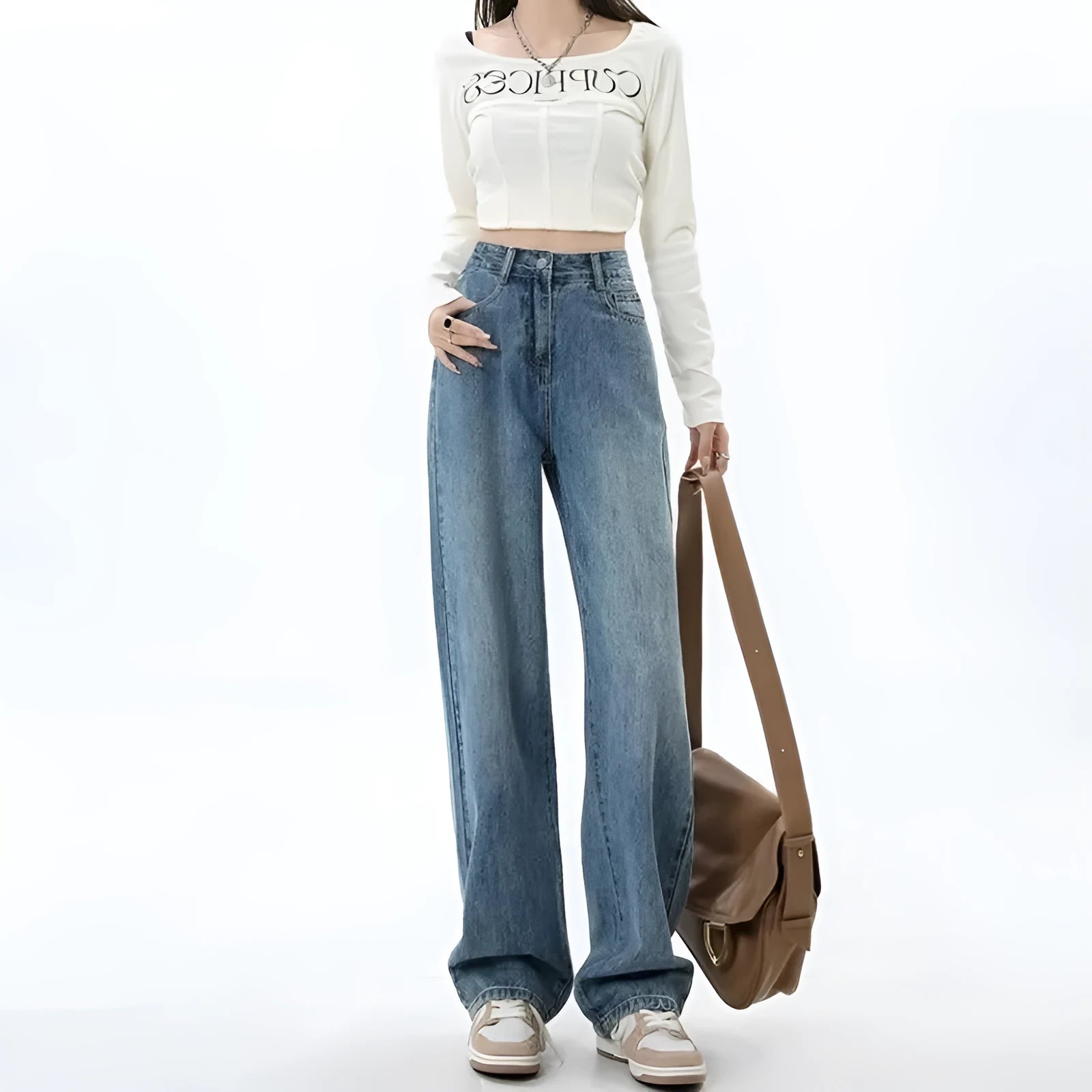 Women's retro blue high waist wide leg jeans on a hanger, showing straight cut and front button detail.
