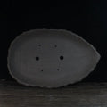 Handmade purple clay flower pot with unique shape showing three size options