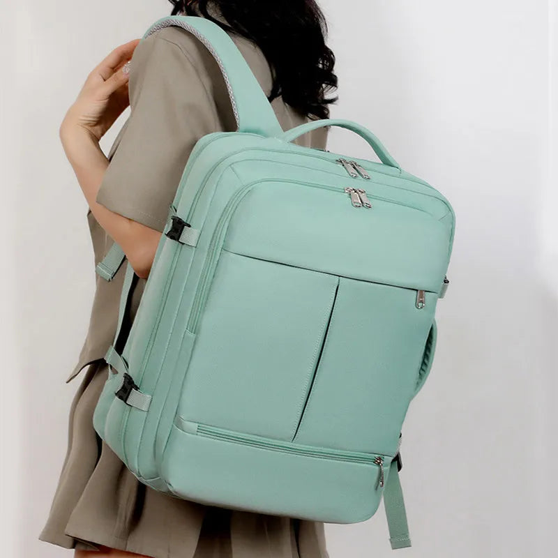 Waterproof Oxford cloth backpack with multiple pockets showing 15.6 inch laptop compartment in black colour
