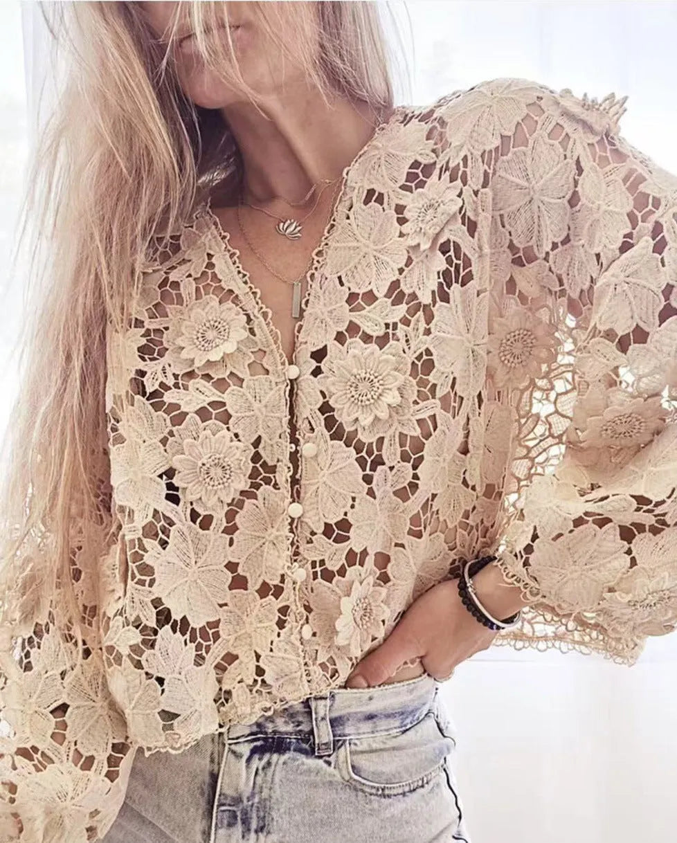 Loose V-neck cardigan with a 3D lace flower decoration in white.