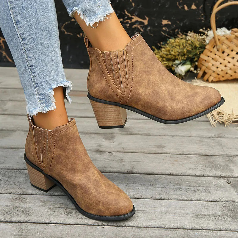 Women's black ankle boots with pointed toe and thick square low heel for autumn winter wear
