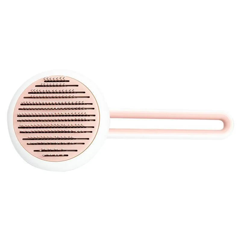 Automatic pet grooming brush with round head and stainless steel pins in blue, green, or pink.