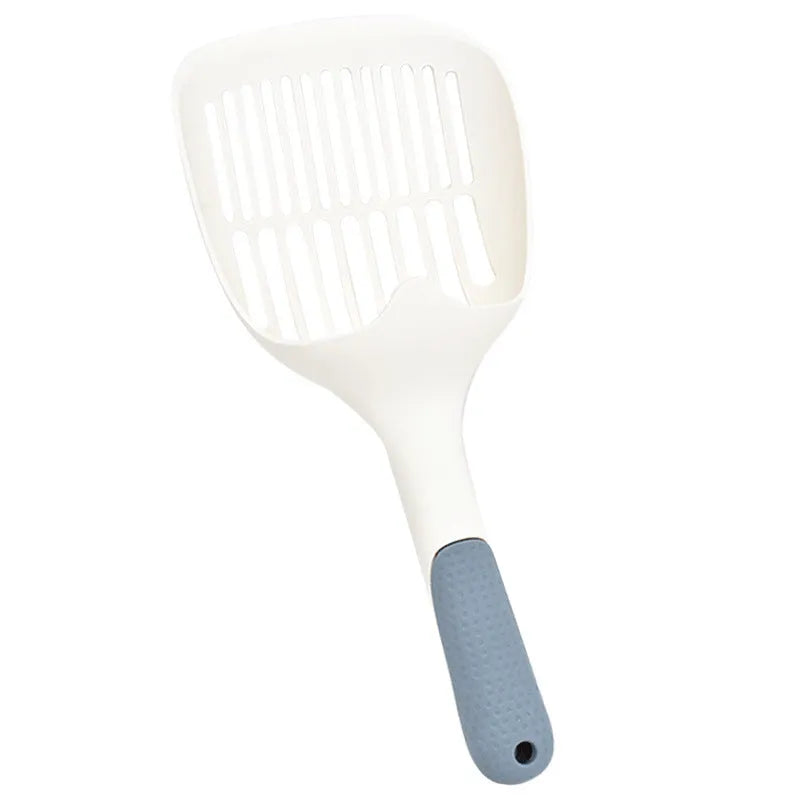 Large white plastic cat litter shovel with angled handle on a grey background.