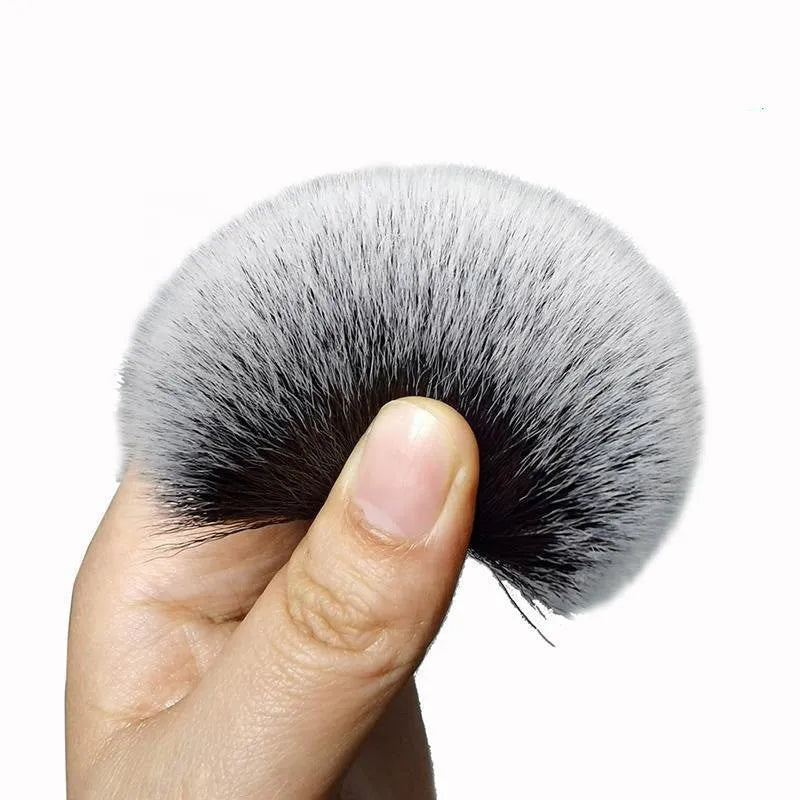 Black car detailing brush with pig hair bristles and polypropylene handle shown in two sizes.