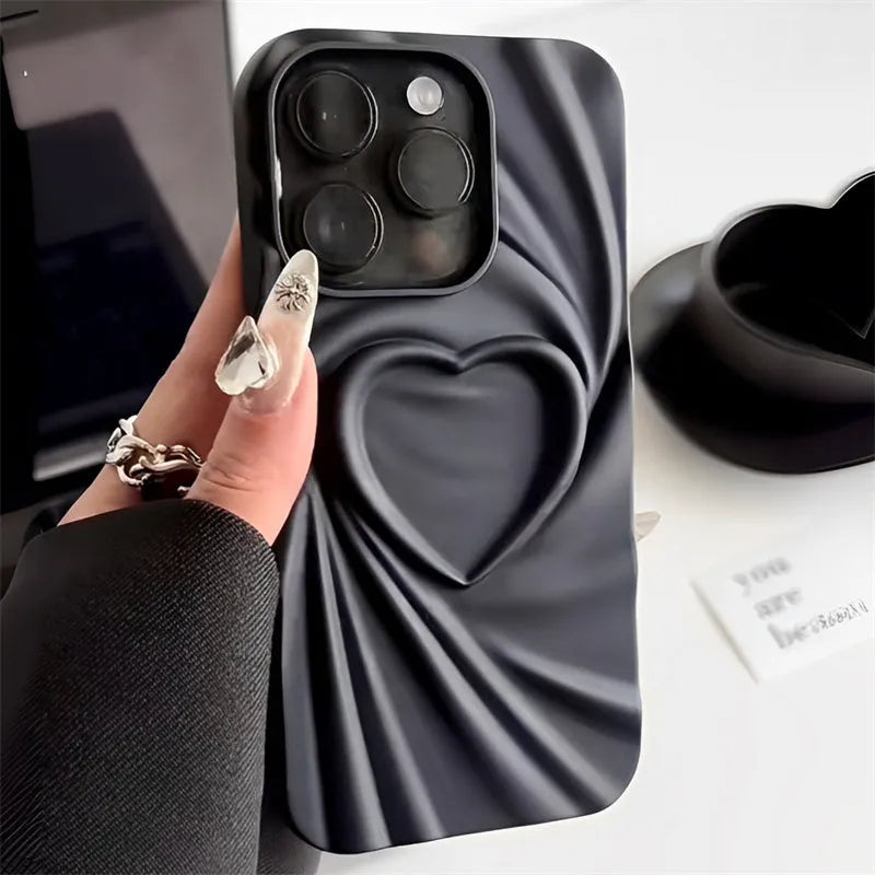 Silicone iPhone case with a simple ruffled heart design in mustard green colour.