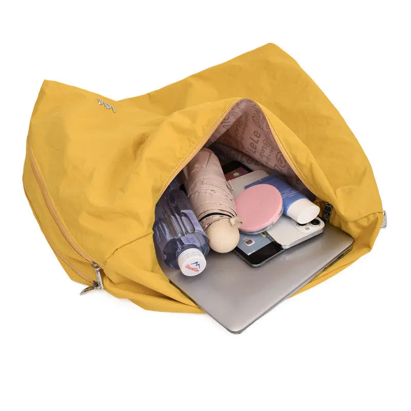 Heart-shaped nylon underarm bag for women in black, blue, khaki, or yellow with large capacity storage