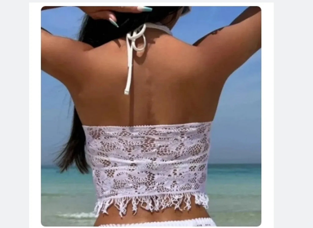 Women's white two-piece swimsuit with tassel skirt beach cover-up