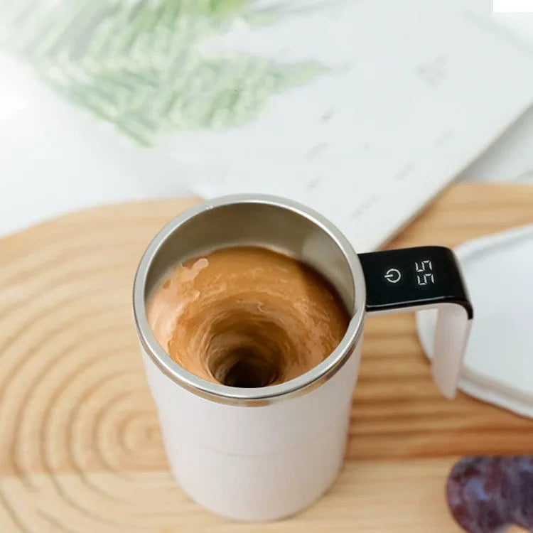Black automatic stirring electric coffee mug with LCD temperature display and USB charging port