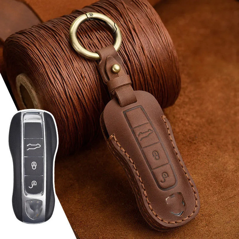 Genuine cowhide leather retro-style key cover for Porsche keys in blue or brown.