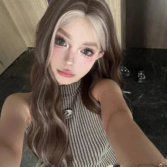 Long curly gray golden highlight lace front wig on display