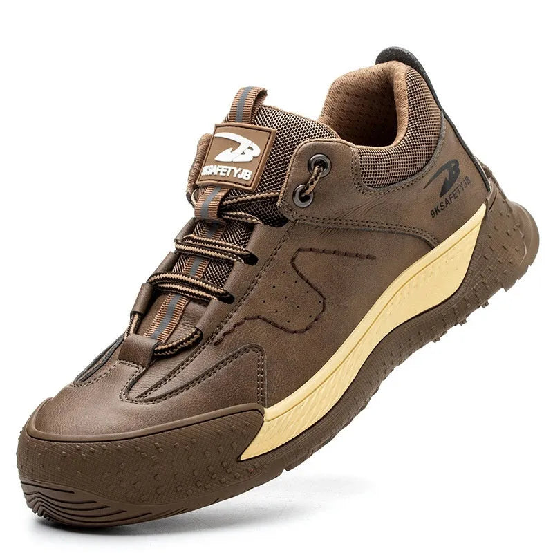 Men's black leather work safety shoes with a rubber sole and Flyknit-style upper on a work site background.