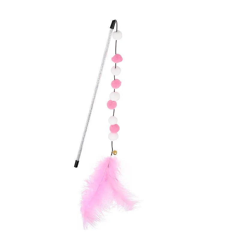 A blue acrylic cat teaser wand with pompon feathers and a bell, shown next to a grey and yellow version.
