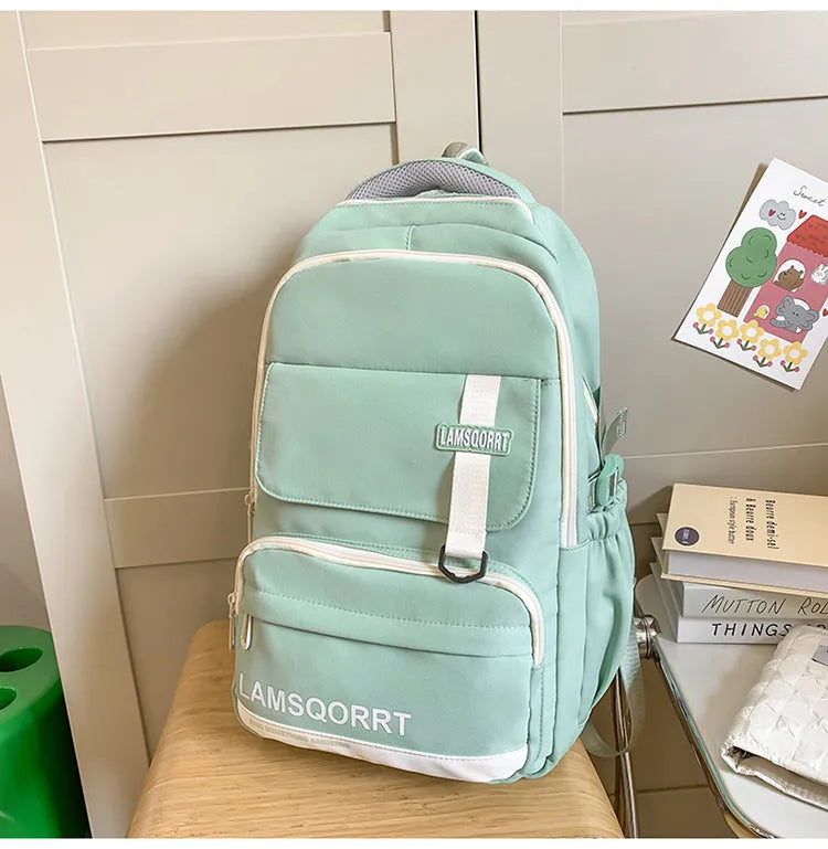 Waterproof nylon high school student backpack in multiple colours with pendant options