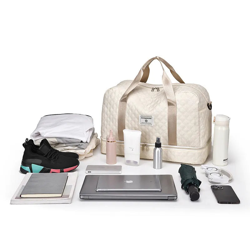 Large solid-colour Oxford cloth travel bag with a 36-55 litre capacity for buggies.