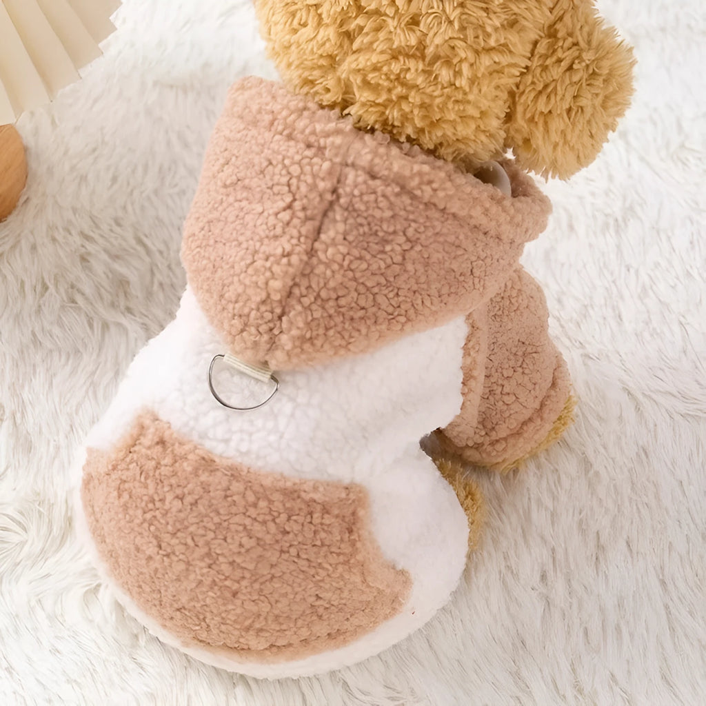 A blue hooded dog coat with thick cotton padding, shown on a model.