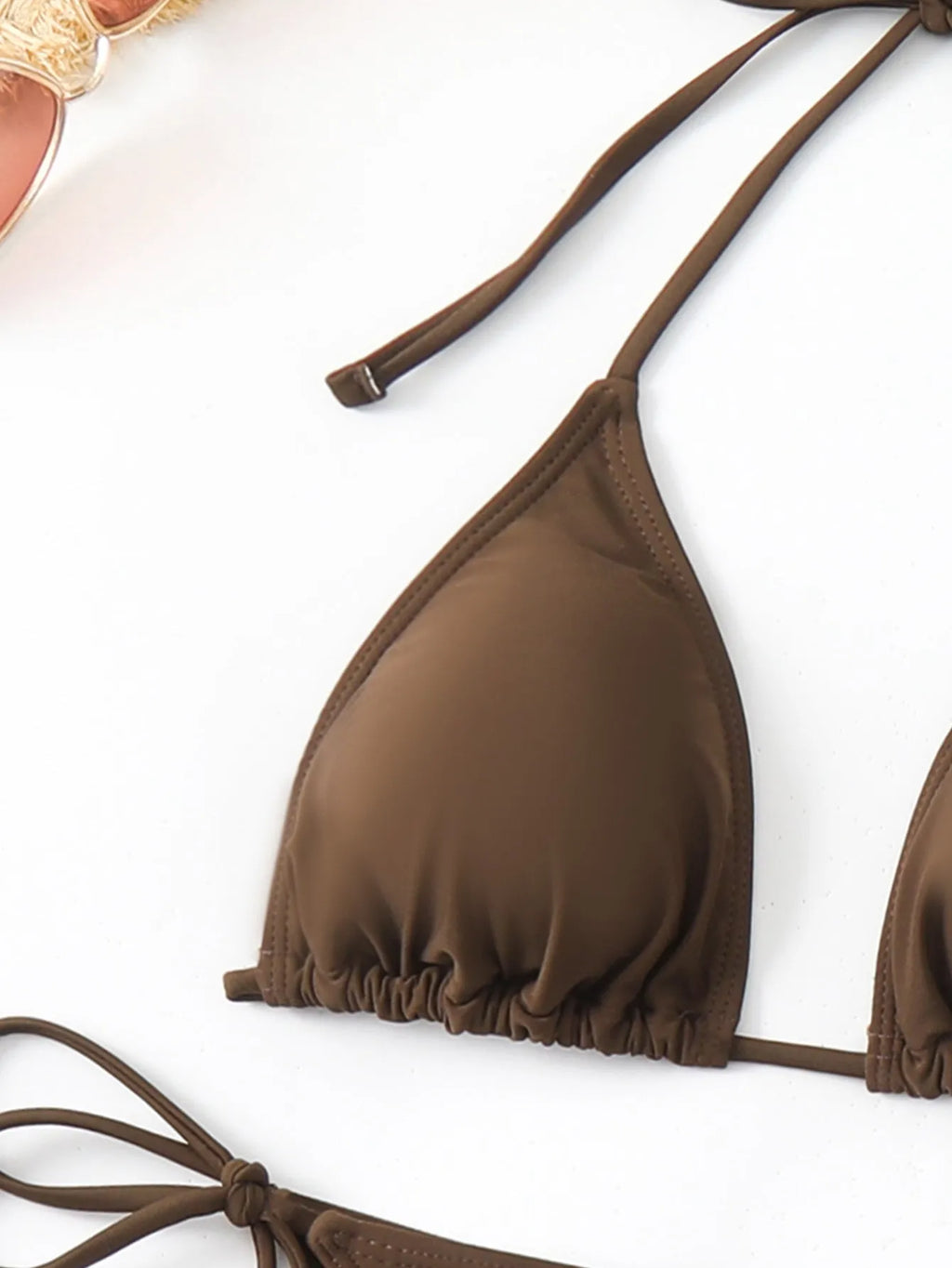 Brown solid colour women's three-piece swimsuit set with bra, shorts, and blouse