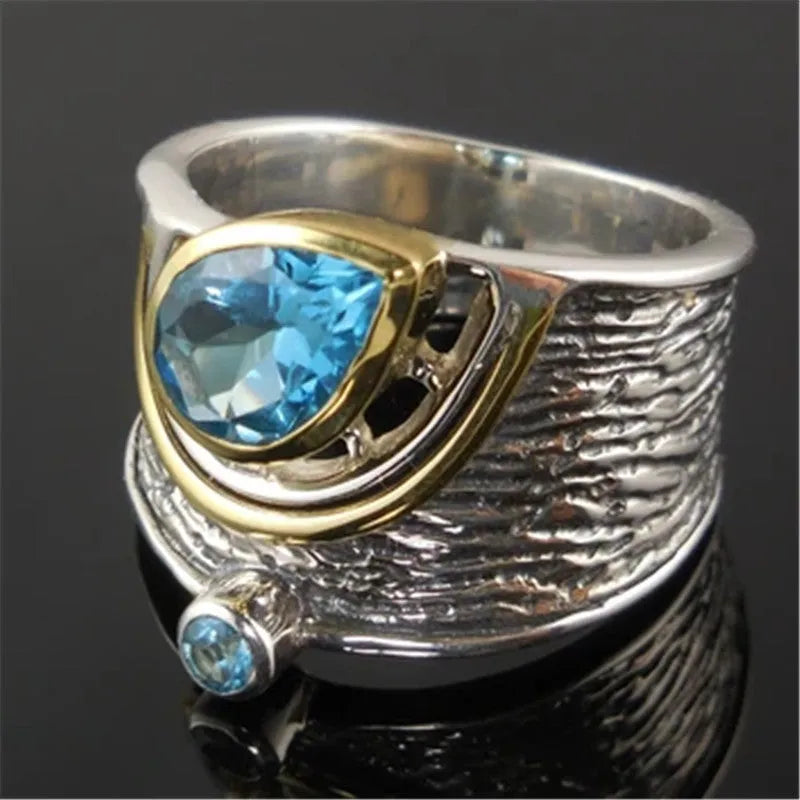 Blue Chinese style zircon ring with drop shape setting on alloy band