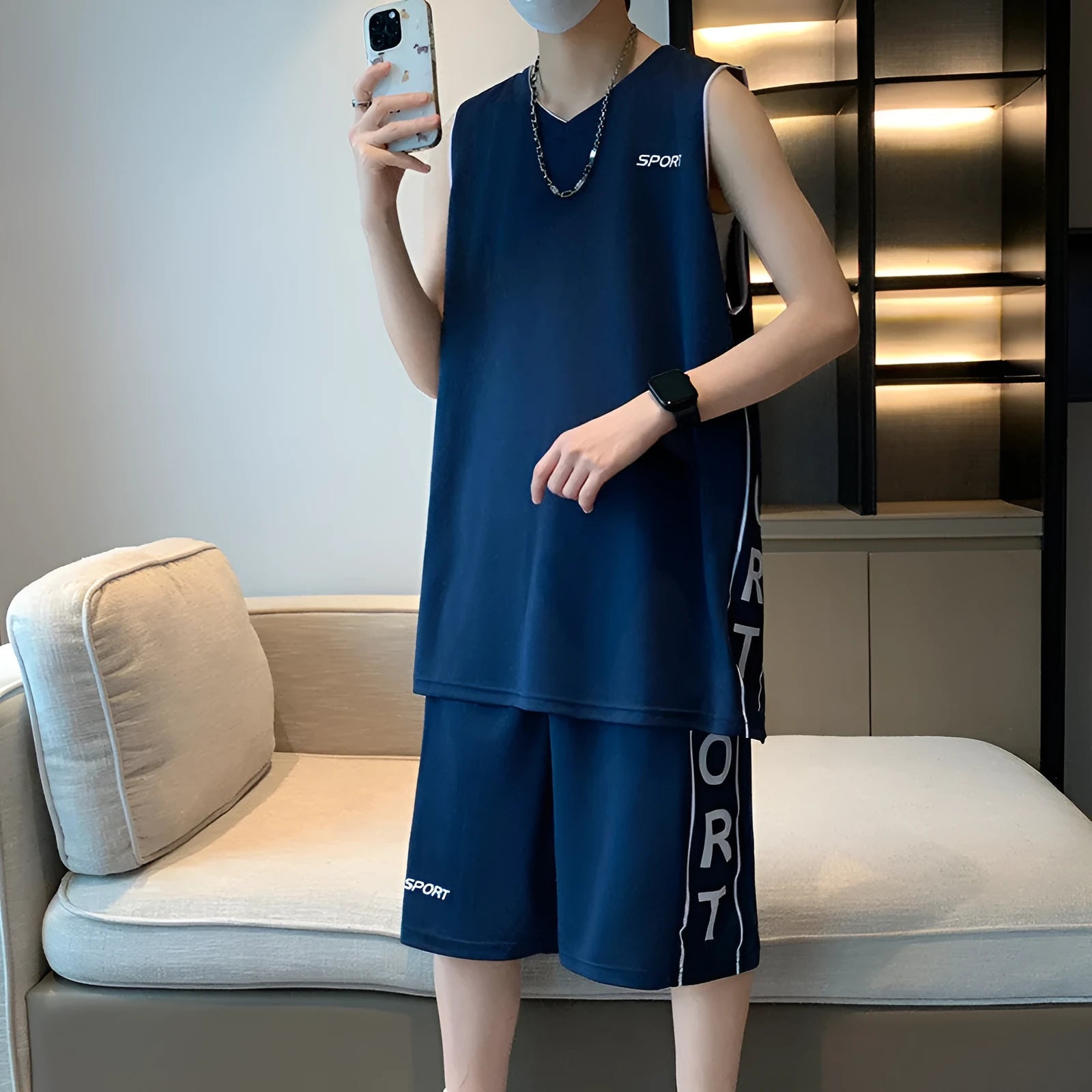 Men's basketball sports suit set showing sleeveless vest and matching shorts in polyester fabric
