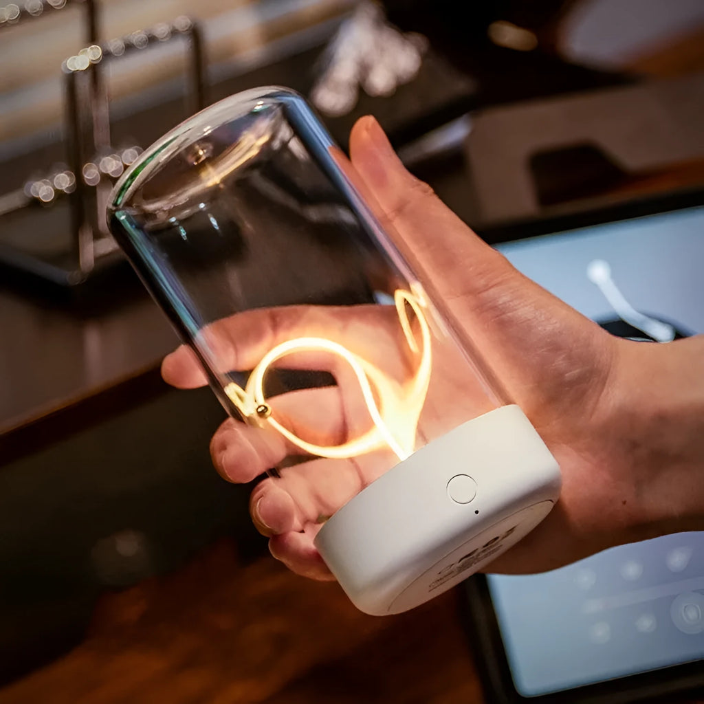 LED camping light with flexible filament design in transparent housing showing Type-C charging port