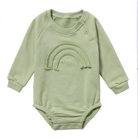Long sleeve waffle cotton baby romper in neutral colour on hanger