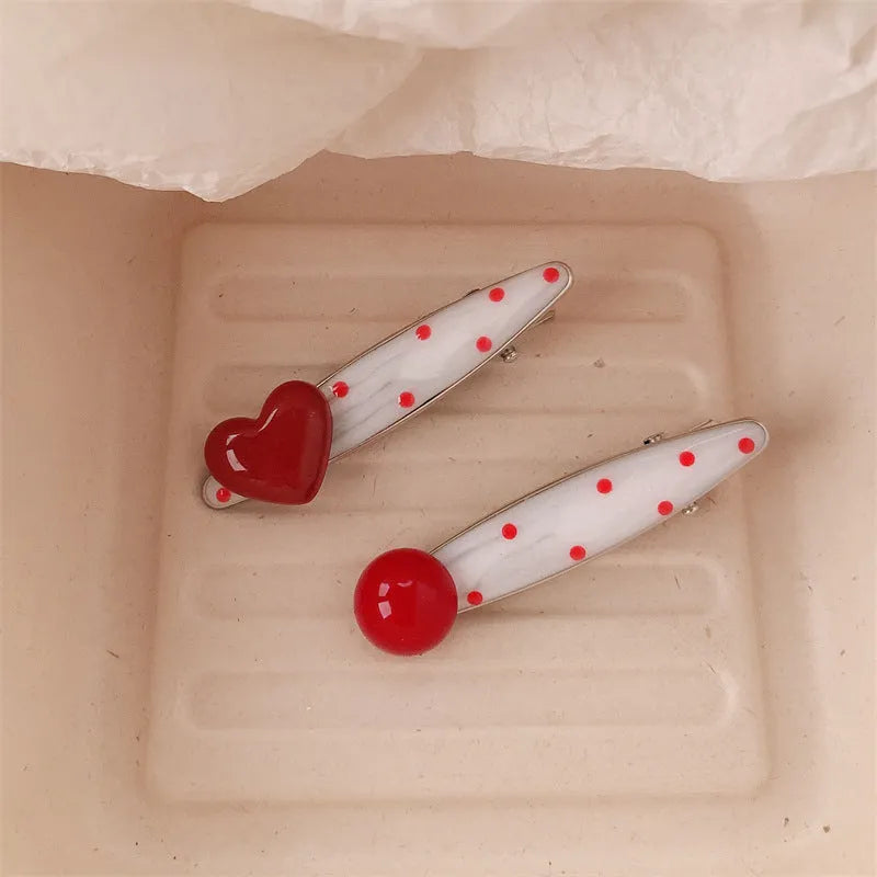 Red love heart-shaped hair barrette with 3D design, retro dots, and willow leaf decoration.
