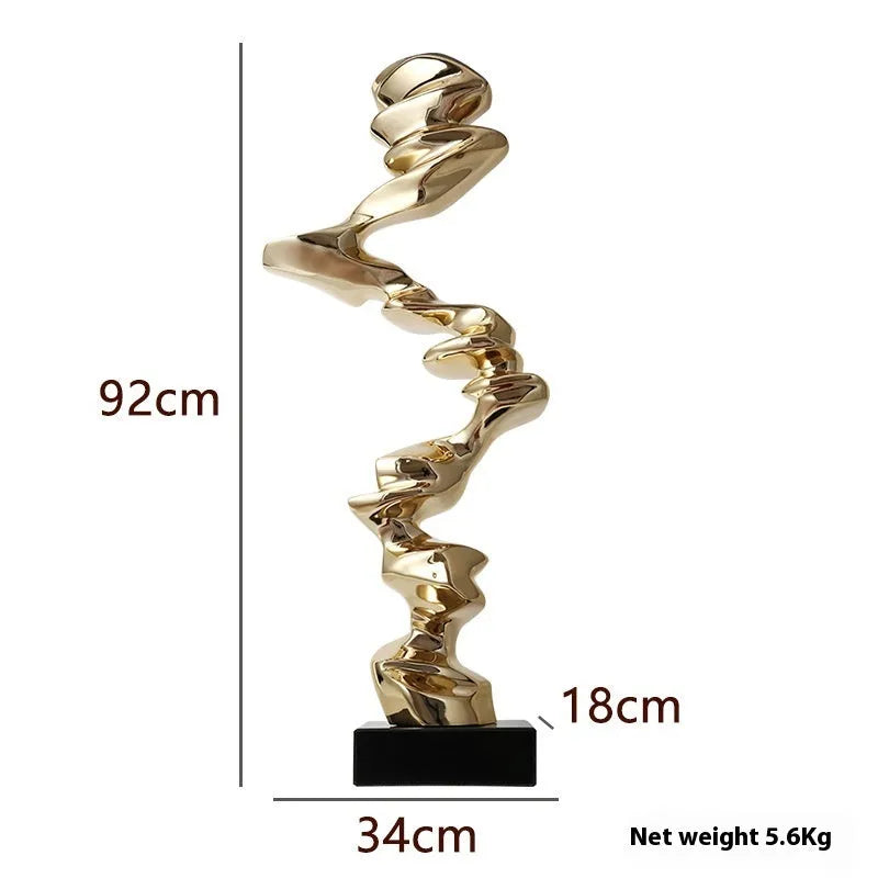 Abstract minimalist resin ornament in metallic colours for modern interior decoration