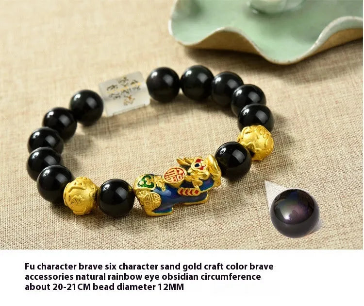 Natural obsidian temperature-sensitive colour change bracelet with gold accents and Pi Xiu motif