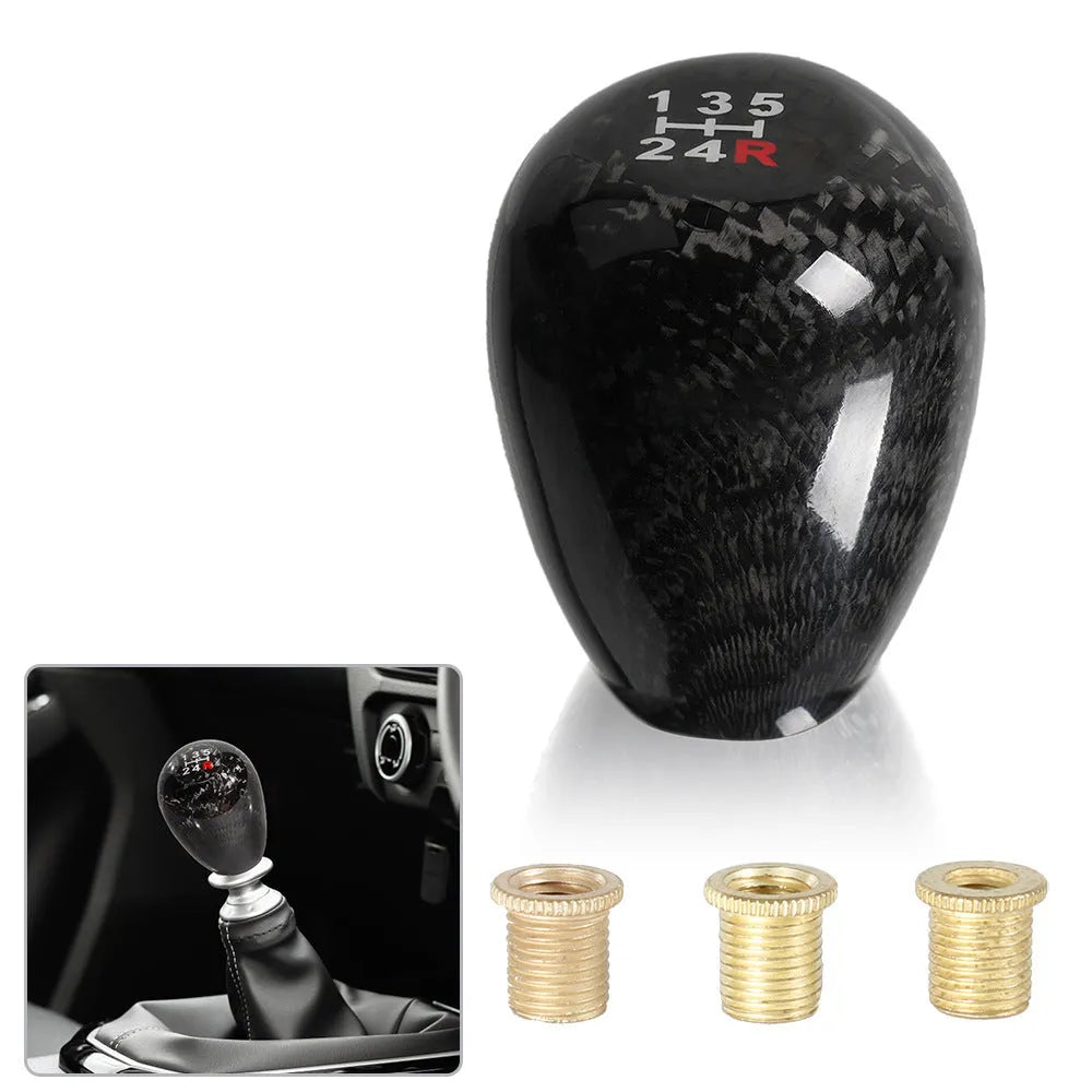 Carbon fibre aluminium alloy gear shift knob on black background for manual transmission cars