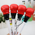 Four black pressure relief pens with boxing press ejection mechanism and 0.7mm bullet tips